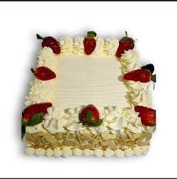 Egg-free strawberry celebration cake decorated with fresh strawberries, smooth vanilla cream, almond flake sides and space for a personalised message.
