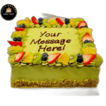 pistachio square celebration cake with strawberries and chocolates in Sheffield