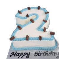 Egg Free number 2 birthday cake with blue piping, chocolate flakes and personalised message, available in any number 0–9 from Cake Palace Sheffield