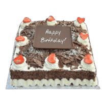 Square Egg Free chocolate celebration cake with fresh strawberry halves, chocolate shavings, chocolate sprinkle sides and custom chocolate message plaque.