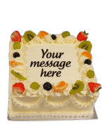 Egg Free Fresh Fruit Celebration Cake decorated with strawberries, kiwi, grapes, mandarin segments, blueberries and a personalised message.