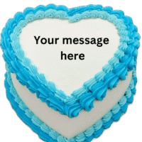 Blue heart-shaped birthday cake with smooth white icing, vibrant blue piped borders, and space for a personalised celebration message.
