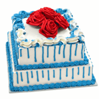 Royal Blue Drip Rose Celebration Cake with fresh cream finish and red roses by Cake Palace