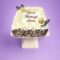 Egg Free Ferrero Chocolate Celebration Cake decorated with Ferrero chocolates, chocolate leaves, mixed chocolate curls and a personalised message.