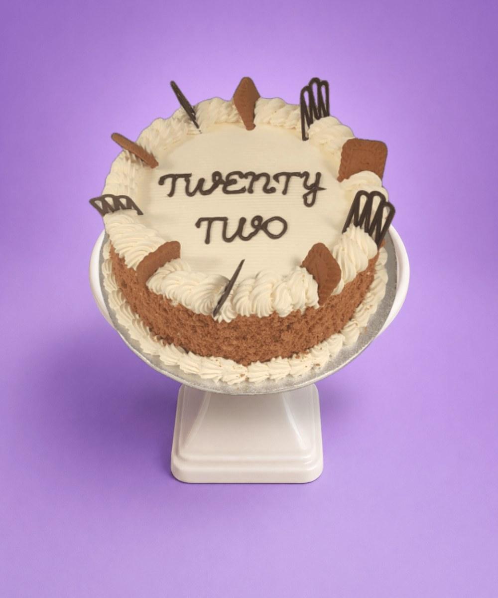Lotus Biscoff Birthday Cake Egg Free Biscoff Celebration Cake decorated with Lotus Biscoff biscuits, Biscoff crumb coating, decorative chocolate pieces and a personalised message.
