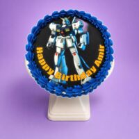Top view of Blue Robot Photo Birthday Cake featuring an edible robot image, navy blue fresh cream border, and personalised birthday design.