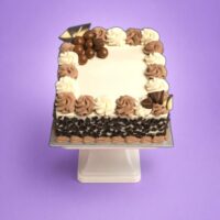 Egg Free Chocolate Celebration Cake with Maltesers, Kinder Bueno, Chocolate Curls ,chocolate fans and personalised message in Sheffield