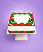Classic Christmas celebration sheet cake with festive red and green buttercream decoration.