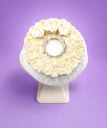 Elegant Ivory Crown Wedding Cake with ivory fresh cream rosettes, silver crown topper, egg-free fresh cream vanilla or chocolate sponge from Cake Palace.