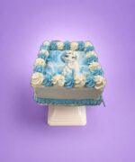 Egg Free Frozen Elsa photo birthday cake with blue and white decorative piping made in Sheffield