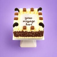 Kinder and Oreo fresh cream birthday cake with chocolate flakes, Kinder chocolate bars, Oreo biscuits, and personalised message