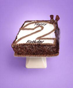 Personalised number birthday cake with chocolate decorations in Sheffield