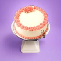Round White Birthday Cake with Pink Rose Decoration