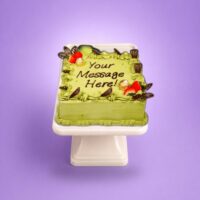 Pistachio square celebration cake with strawberries and chocolates in Sheffield