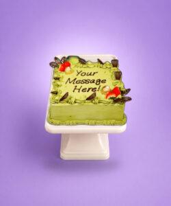 Pistachio square celebration cake with strawberries and chocolates in Sheffield