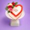 Egg Free Rose Heart Celebration Cake with fresh roses and red cream border, handmade in Sheffield