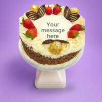 Signature Ferrero Strawberry Delight egg free fresh cream decorated with mix sprinkles on side, ferrero ,strawberry and chocolate fans on top birthday cake